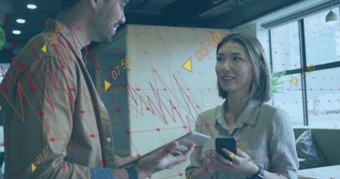 Diverse Team Discussing Business Growth with Digital Data Overlay