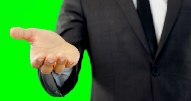 Businessman Reaching Out Hand Gesture on Green Background - Download Free Stock Images Pikwizard.com