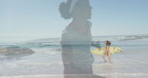 Double exposure beach portrait blending joyful woman silhouette with surfer and shoreline