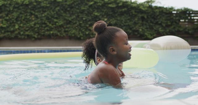 Joyful Children Playing Submerged in Pool During Summer - Download Free Stock Images Pikwizard.com