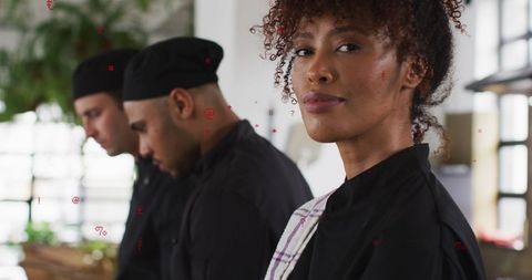 Confident African American Chef in Restaurant Kitchen