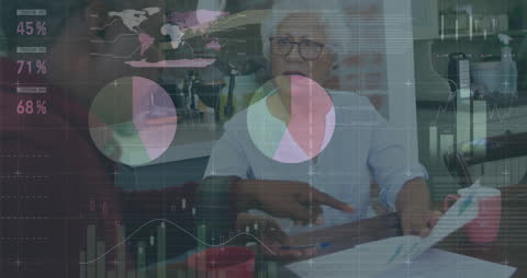 Diverse Seniors Analyzing Financial Data with Futuristic Overlay