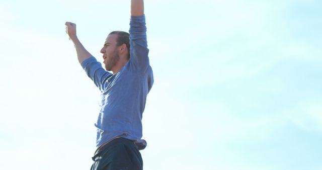 Happy Man Celebrating Victory Outdoors - Download Free Stock Images Pikwizard.com