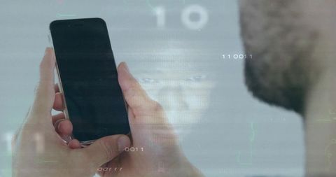 Man Manipulating Smartphone Screen with Floating Enhancements and Digital Code