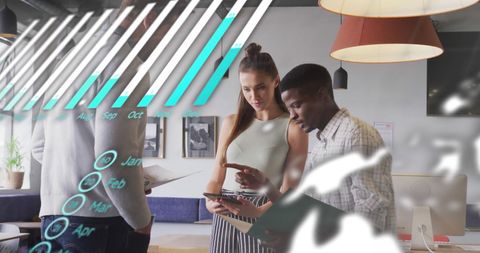 Team Analyzing Financial Data Projections in Modern Workspace