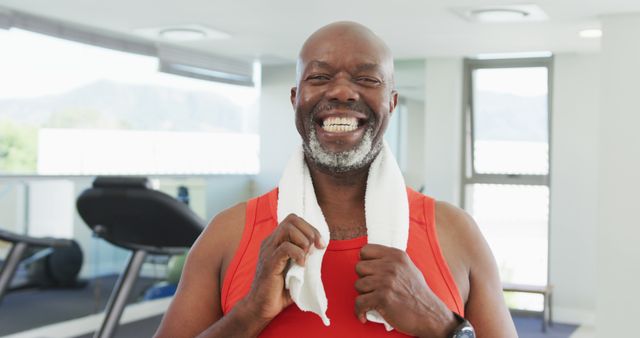 Image of thoughtful senior african american men is exercising at the gym. Retirement lifestyle, spending time alone,active leisure time.