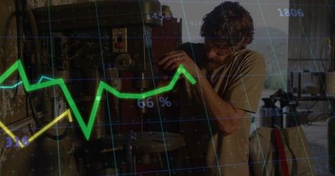 Industrial worker adjusting drill press with analytics overlay
