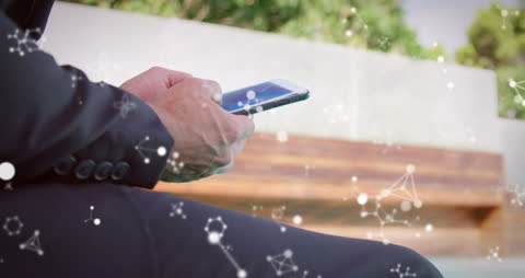Businessman Using Smartphone with Molecular Animation Overlay