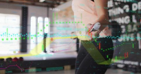 Woman pointing at finance charts with stylus for data visualization presentation in office