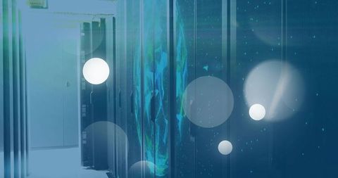 Glowing server racks projecting digital globe in data center