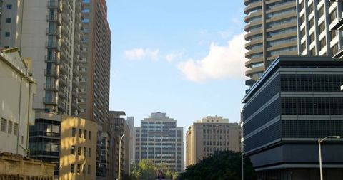 Urban skyline with mid-rise buildings and clear sky
