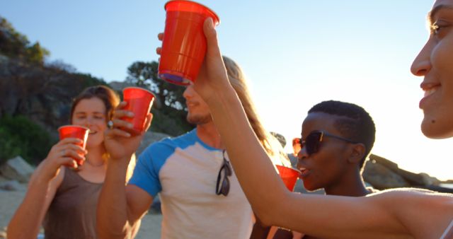 Friends Enjoying Summer Beach Party with Drinks - Download Free Stock Images Pikwizard.com