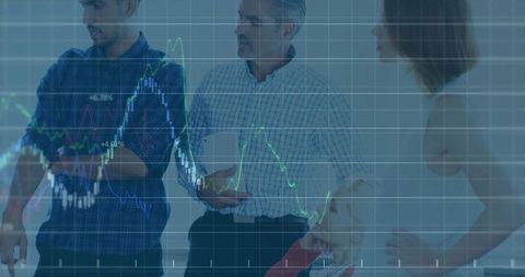 Professionals Analyzing Data Projections in Modern Boardroom