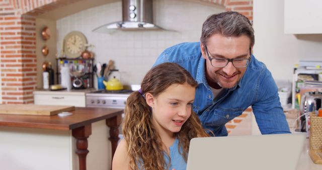 Father and Daughter Enjoying Digital Learning in Cozy Kitchen - Download Free Stock Images Pikwizard.com