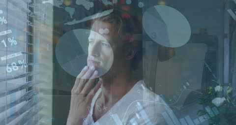 Thoughtful Man Examining Infographic Interface