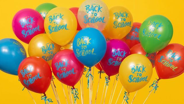 Colorful Back to School Balloons on Bright Yellow Background