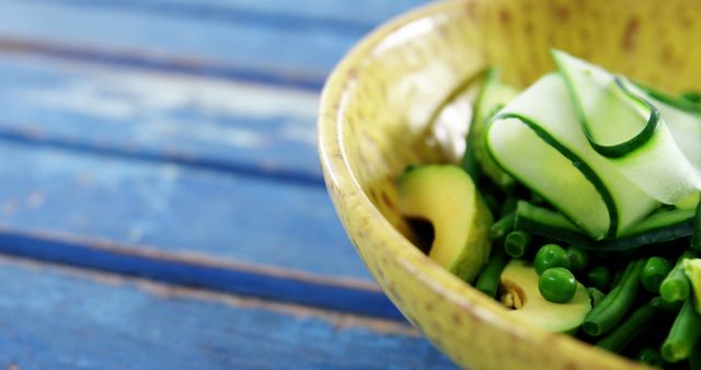 Fresh Green Vegetable Salad in a Yellow Ceramic Bowl - Download Free Stock Images Pikwizard.com