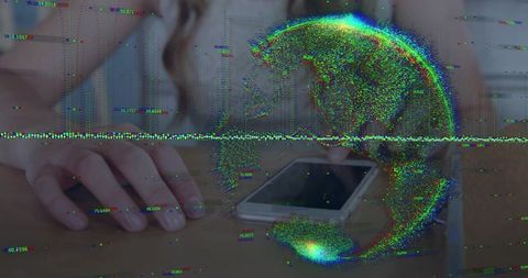 Resting adult female hand beside smartphone on wooden tabletop with neon glitch globe