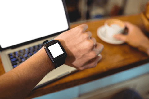 Transparent Smartwatch Screen by Laptop, Person Holding Coffee - Download Free Stock Videos Pikwizard.com