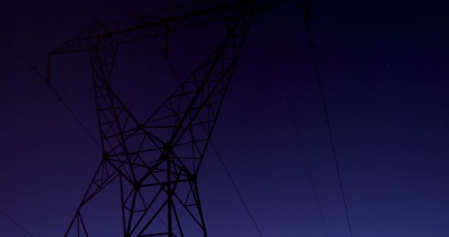 High Voltage Electric Tower Against Midnight Blue Sky - Download Free Stock Images Pikwizard.com