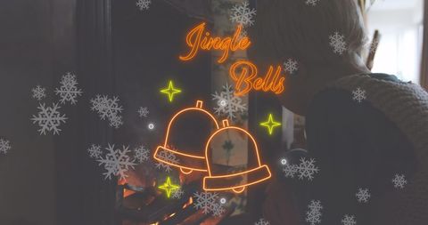 Jingle bells neon glow with warm fireplace ambiance