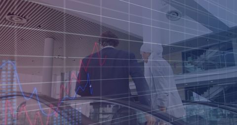 Businesspeople Analyzing Digital Financial Graph in Modern Office