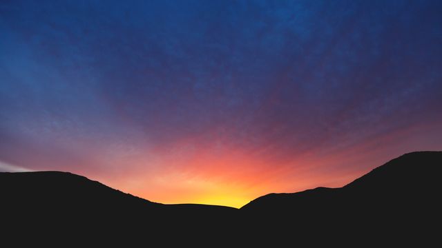 Stunning Colorful Sunrise Between Mountain Peaks - Download Free Stock Photos Pikwizard.com