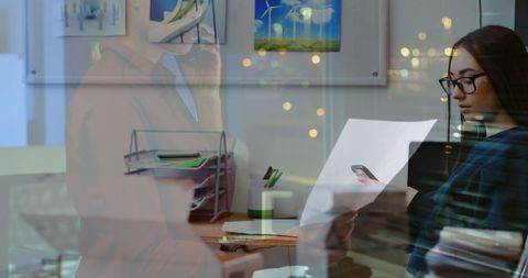 Business Professionals Leveraging Smart Technology for Creative Solutions