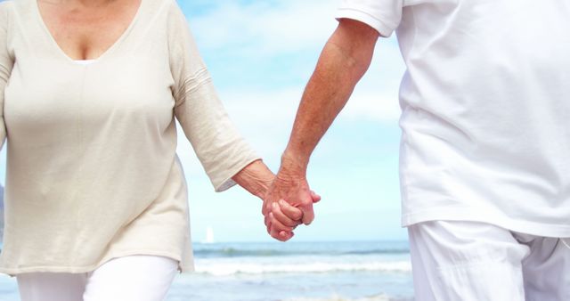 Close-up of Elderly Couple Holding Hands on Beach - Download Free Stock Images Pikwizard.com