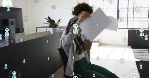 Businesswoman leaning on swivel chair holding paper at reception with digital network overlay