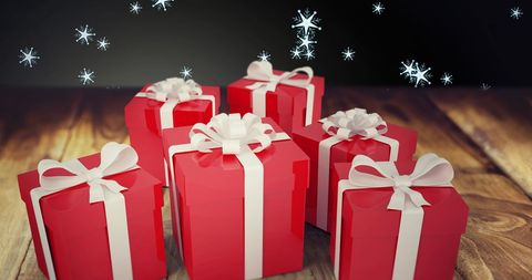 Festive Red Christmas Presents with Falling Snowflakes - Download Free Stock Images Pikwizard.com