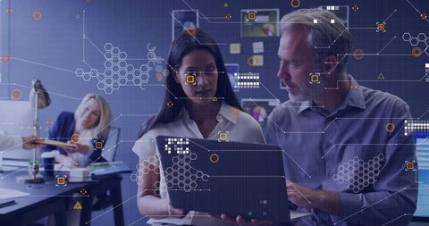 Collaborating on Data Visualization: Analyzing Network Patterns on Laptop, Teamwork