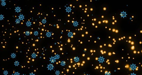Blue snowflakes and golden lights in motion