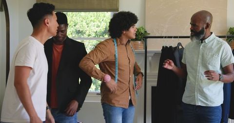Men Preparing for Wedding Day in Living Room Gathering