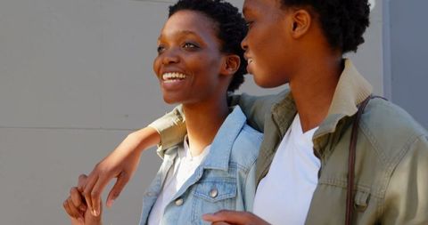 Twin Sisters Walking and Bonding Outdoors