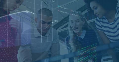 Diverse Team Analyzing Stock Market Data in Office Environment