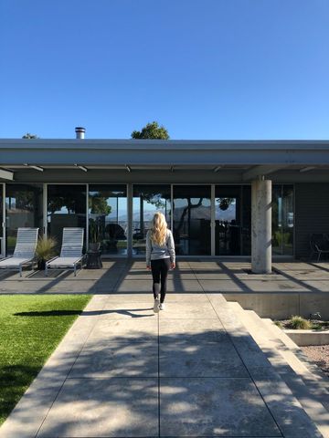 Modern Home Entrance with Minimalist Architecture and Relaxing Views