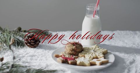 Festive Holiday Cookies and Milk with Happy Holidays Greeting