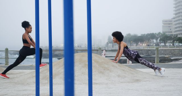 Two Women Exercising Outdoors on a Foggy Morning - Download Free Stock Images Pikwizard.com