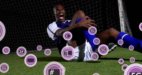 Soccer player in pain holding knee with 5g technology influence