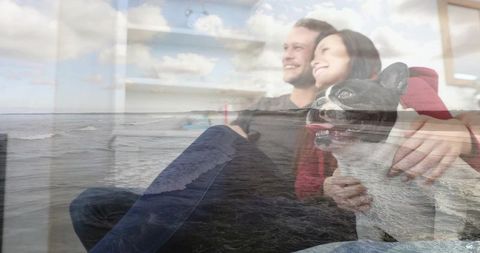 Smiling Couple with French Bulldog Overlapping Ocean Scene