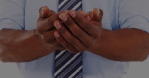 Professional Hands in Gesture of Offering Emphasizing Business Etiquette