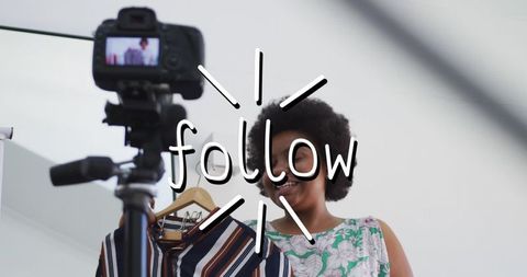 African american woman vlogging fashion choices for social media channel