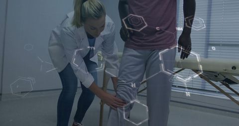Physiotherapist Assisting Patient with Augmented Reality Overlay