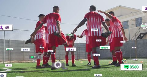 Diverse Soccer Team Engaging in Pre-Game Stretching with Social Media Integration