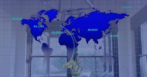 Displaying Blue Digital World Map Overlay on Office Window Showing Cyan Data Points