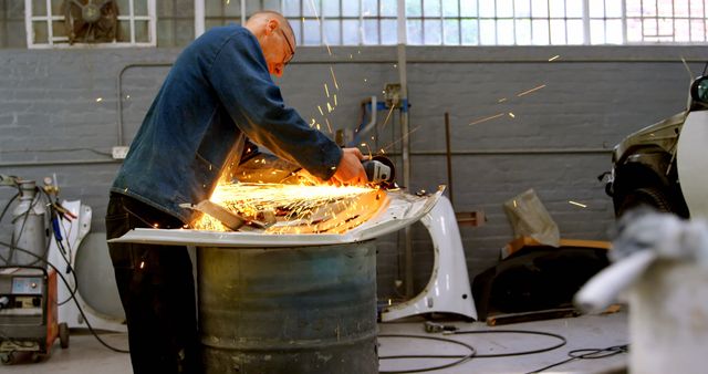 Metalworker Using Angle Grinder in Workshop Creating Sparks - Download Free Stock Images Pikwizard.com