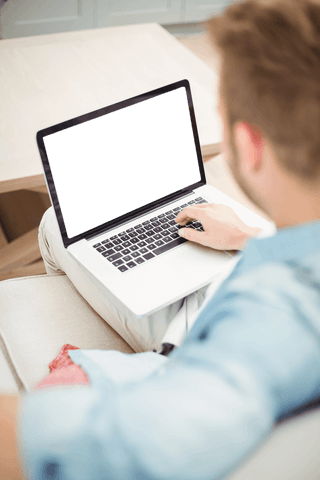Young Man Using Laptop with Transparent Screen at Home - Download Free Stock Videos Pikwizard.com