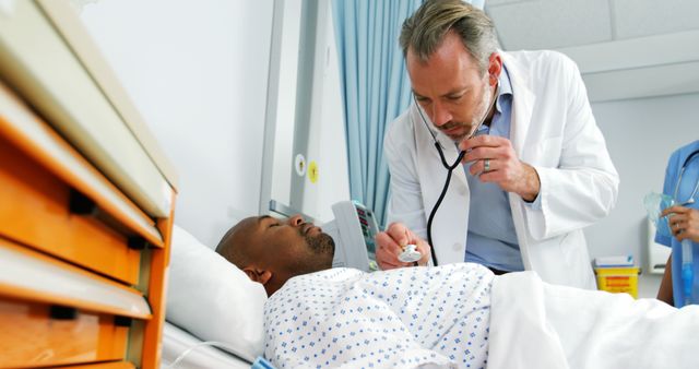 Doctor Checking Patient Vital Signs in Hospital Room - Download Free Stock Images Pikwizard.com