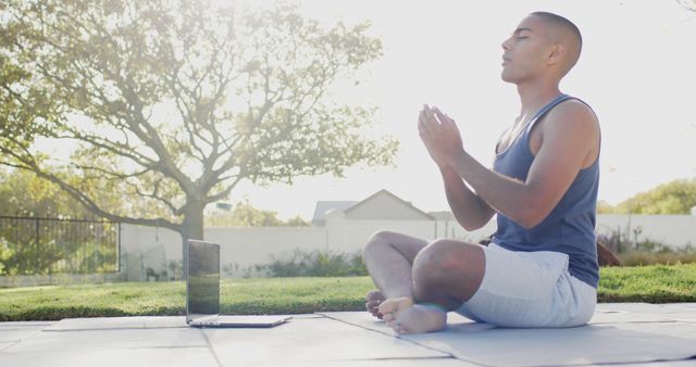 Man Meditating Outdoors While Watching Online Yoga Session - Download Free Stock Images Pikwizard.com